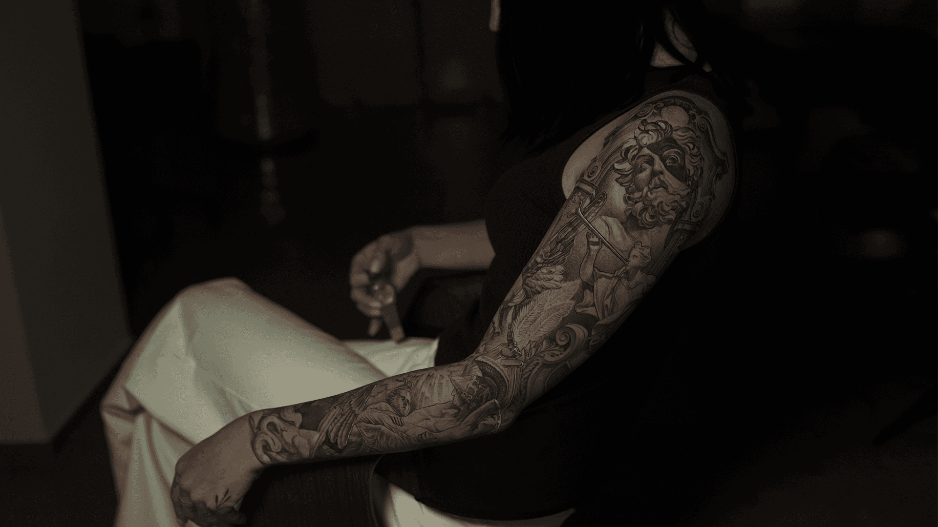 Full sleeve tattoo in black and grey realism by Artem at Samadhi studio, Uluwatu Bali
